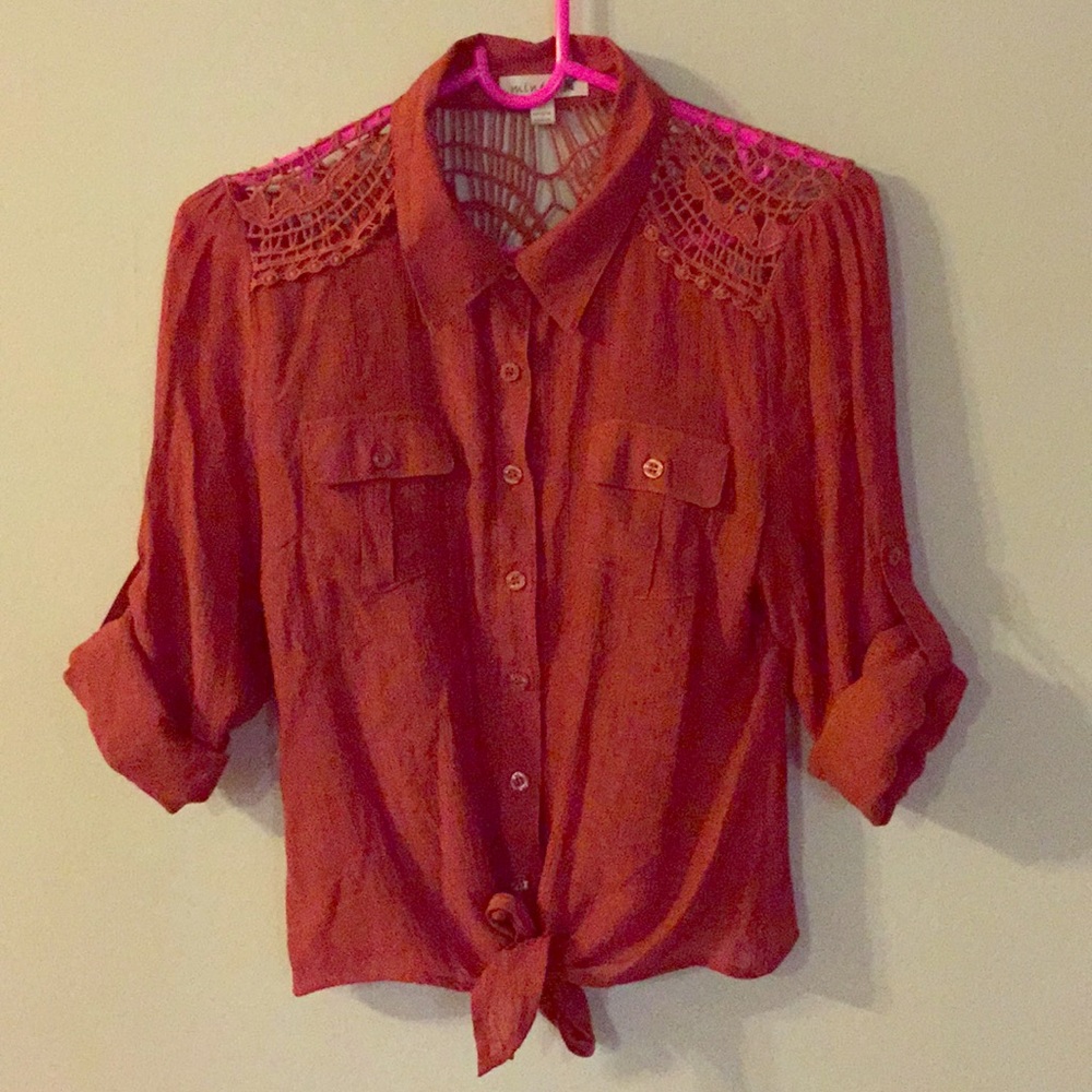 A copper button down with embroidered detail.